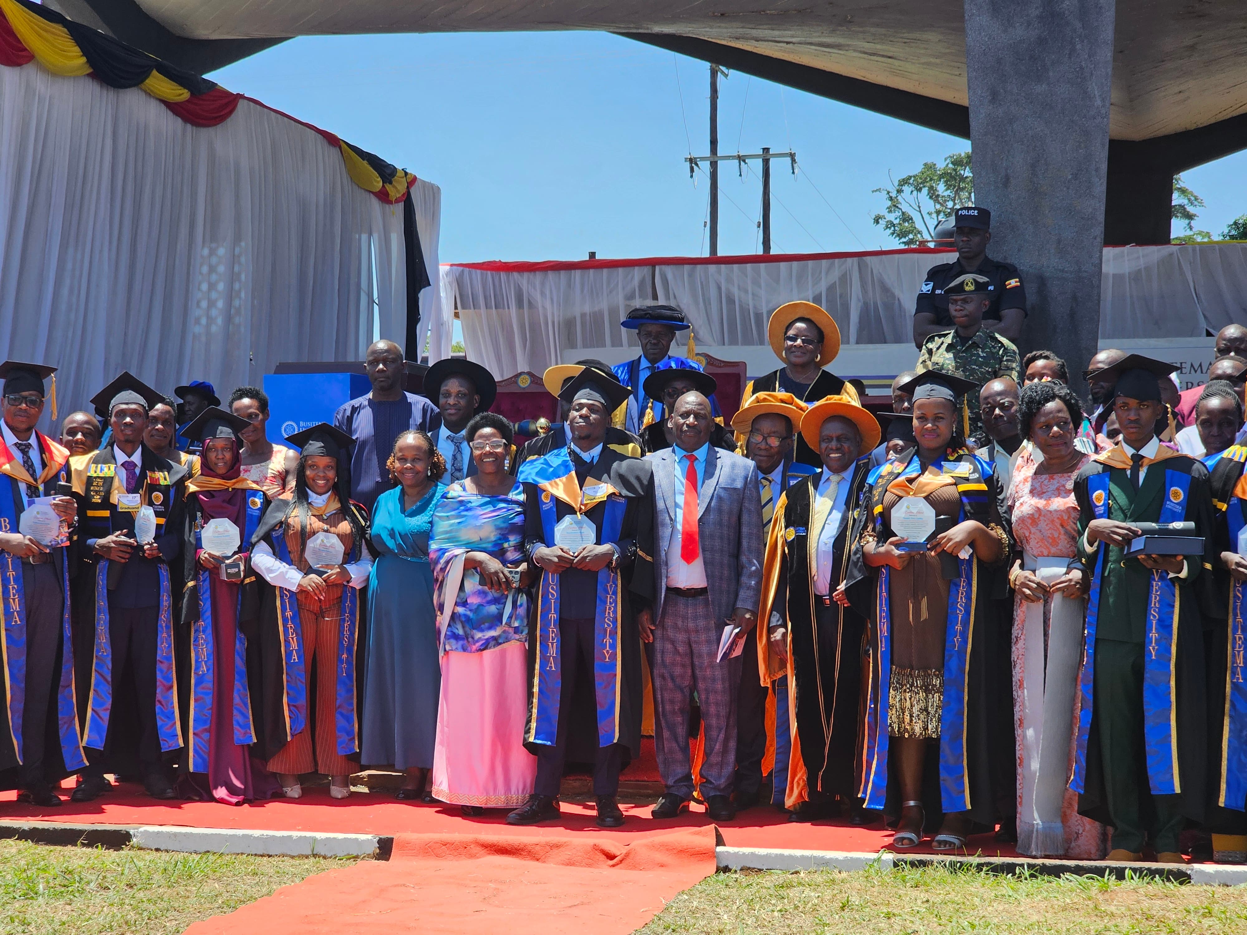 Busitema University’s best-performing graduates pose with University leaders and guests after receiving recognition during the 17th Graduation Ceremony at Busitema Campus on 3 October 2026.