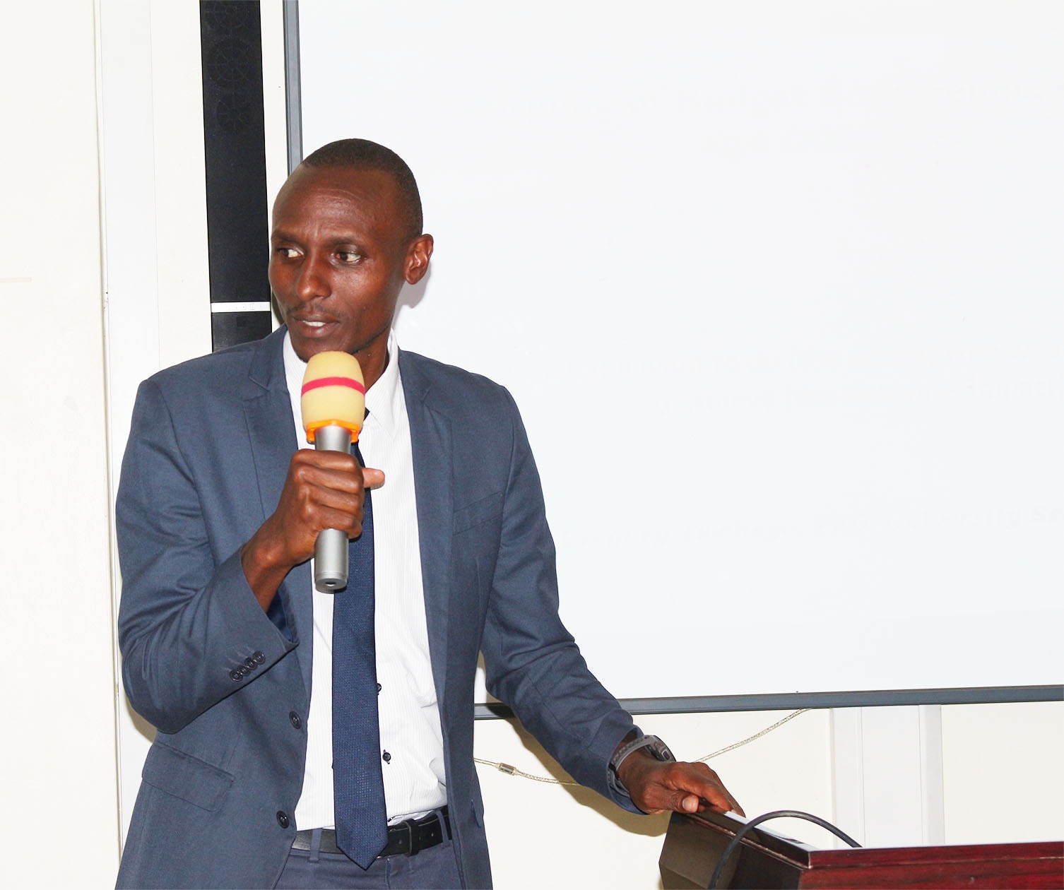 University Secretary Dr. Gregory Tweheyo presents the results-based planning framework during the FY 2027/2028 Budget Conference at Busitema Campus on 23 October 2026.
