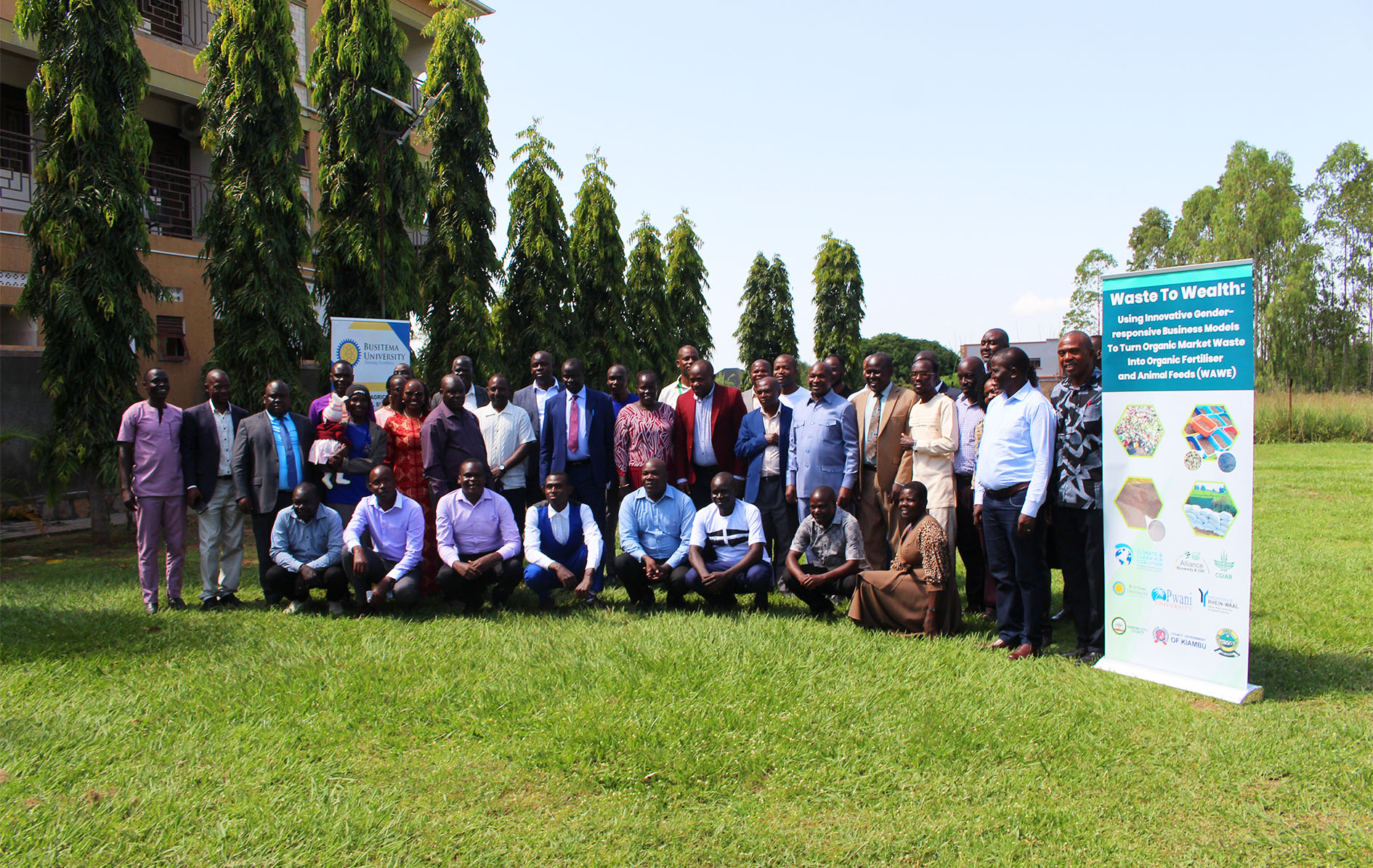 Participants and stakeholders of the Waste to WealthWorkshop pose for a group photograph