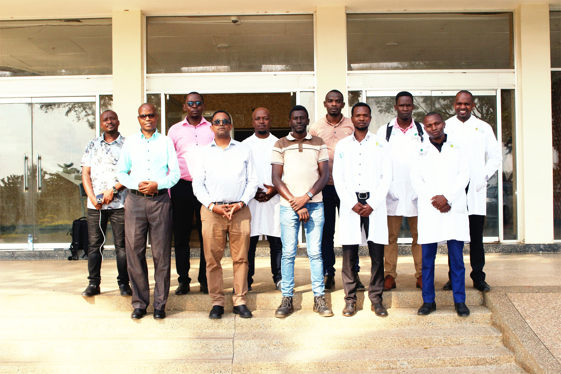 Mr. Redda, University leadership, BANATEX-EA project team members and postgraduate students pose for a group photograph following the monitoring and engagement visit