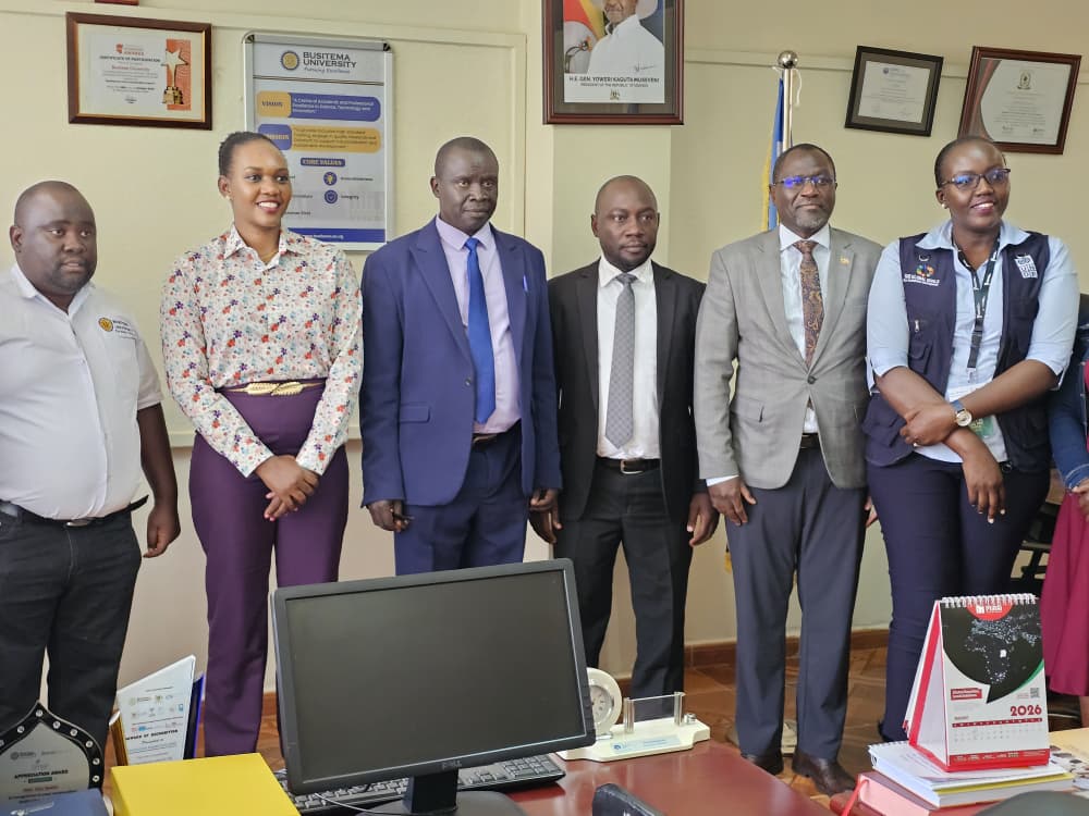 Hon. Phiona Nyamutoro, State Minister for Minerals, and Busitema University Vice Chancellor Prof. Paul Waako pose with officials and development partners during her visit to Busitema University on 14 August 2026.
