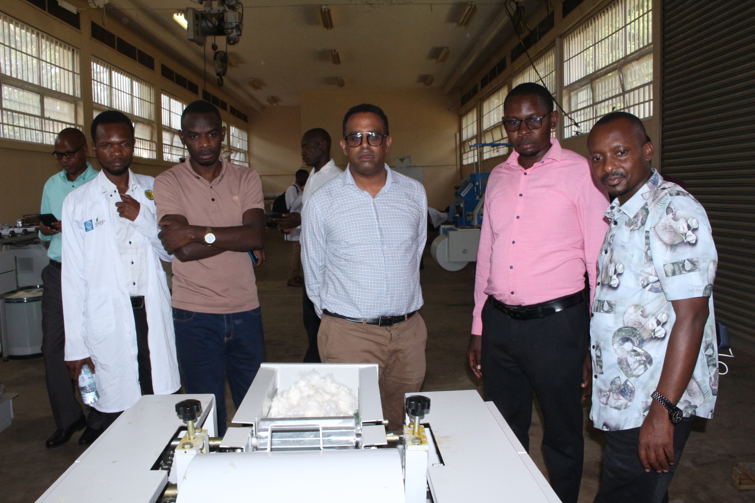 Mr. Redda, inspects banana fibre processing equipment during a monitoring and engagement visit to Busitema University under the UK Government-funded SMEP