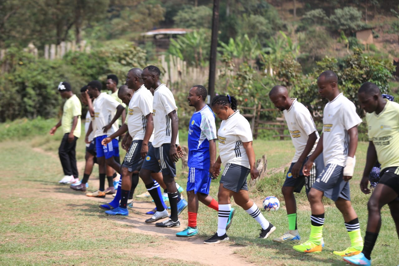 Members of Busitema University's corporate sports team participate in a group exercise during the Uganda National Corporates Tournament Western Edition in Kabale.