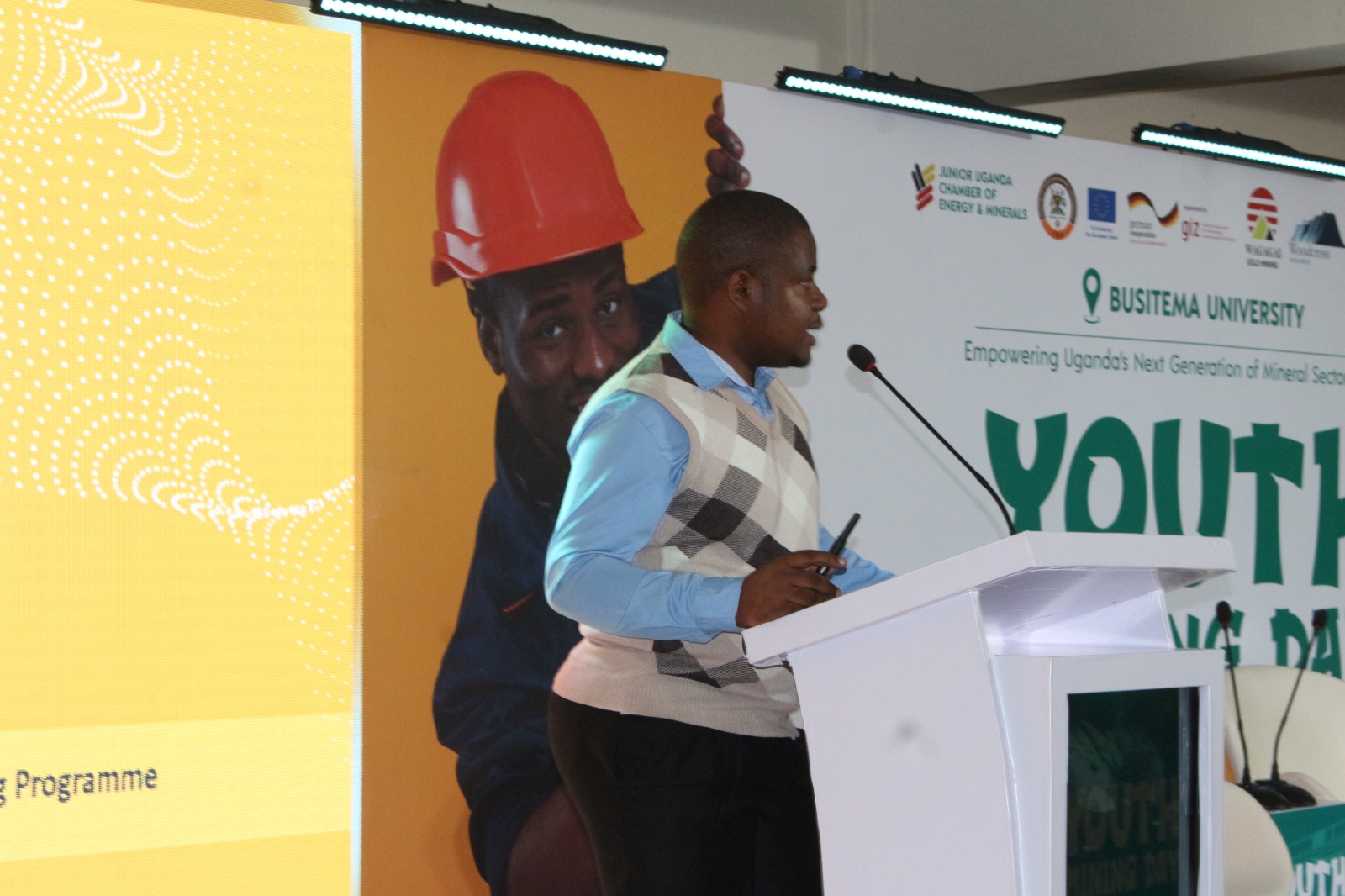 Kwikriza Mathias, Graduate Fellow in Mining Engineering and Team Leader of the Mining Engineering Students’ Association, delivers his presentation during Youth Mining Day at Busitema University Main Campus on 14 August 2026.