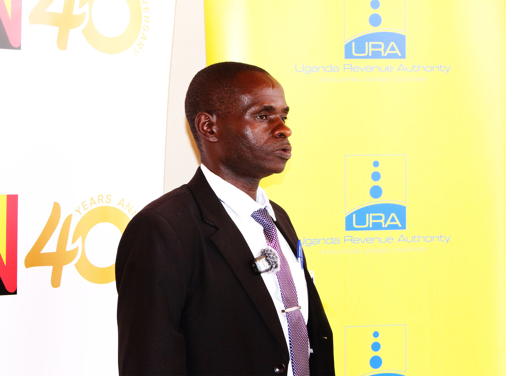 Mr. Owino, addresses the media during the engagement