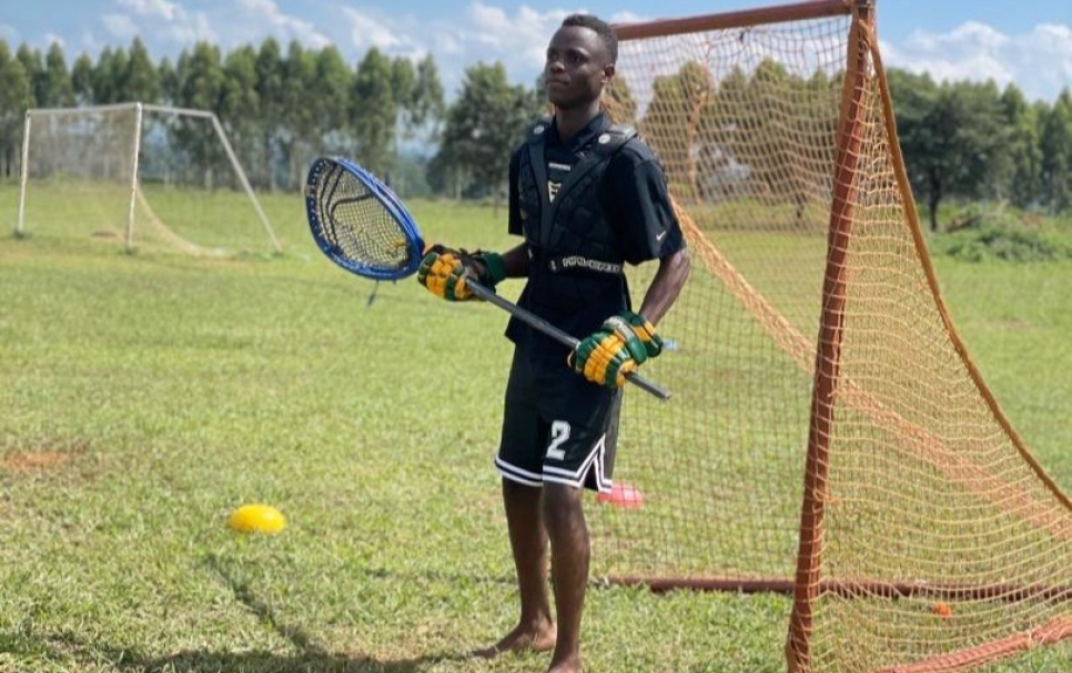 The goal keeper keeps a close eye on the ball during practice